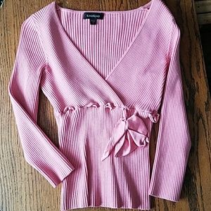 Bebe. 3/4  length sleeves , wide v necked sweater.